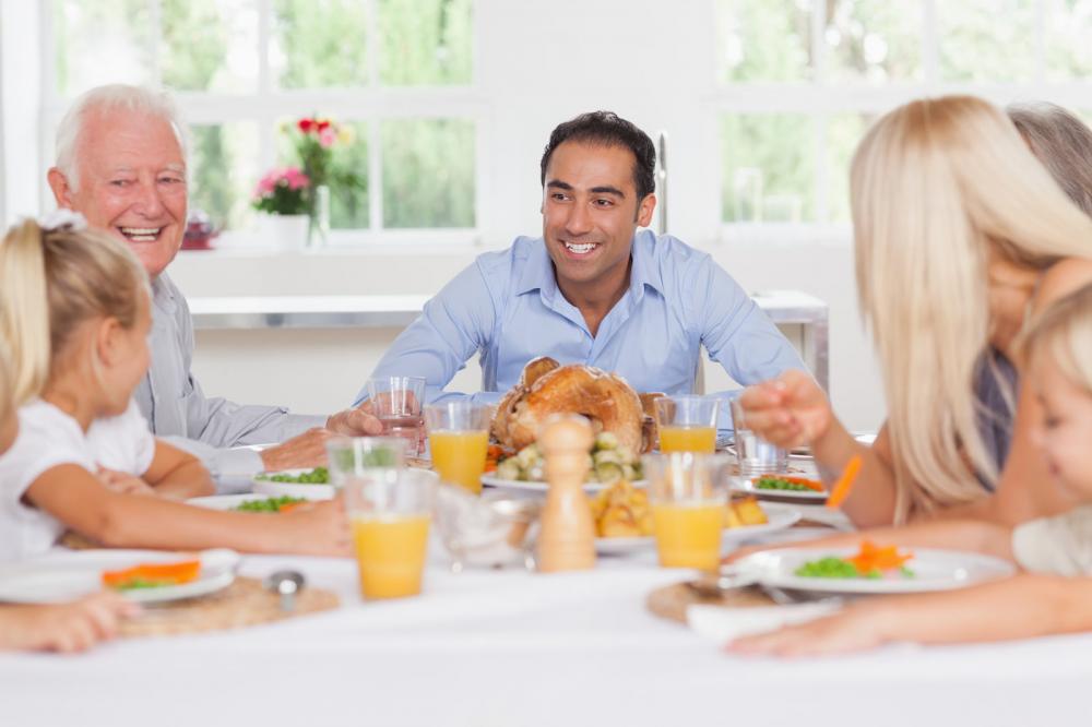 Family enjoying Thanksgiving dinner together