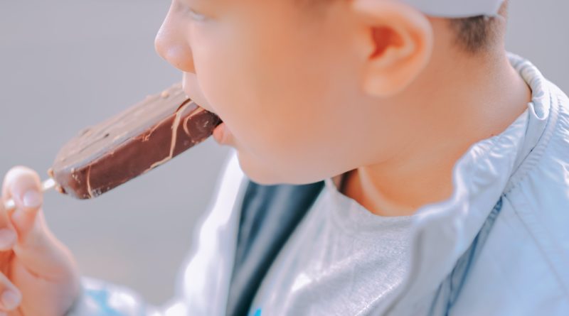 A park-goer enjoys a delicious chocolatey treat at Disney World