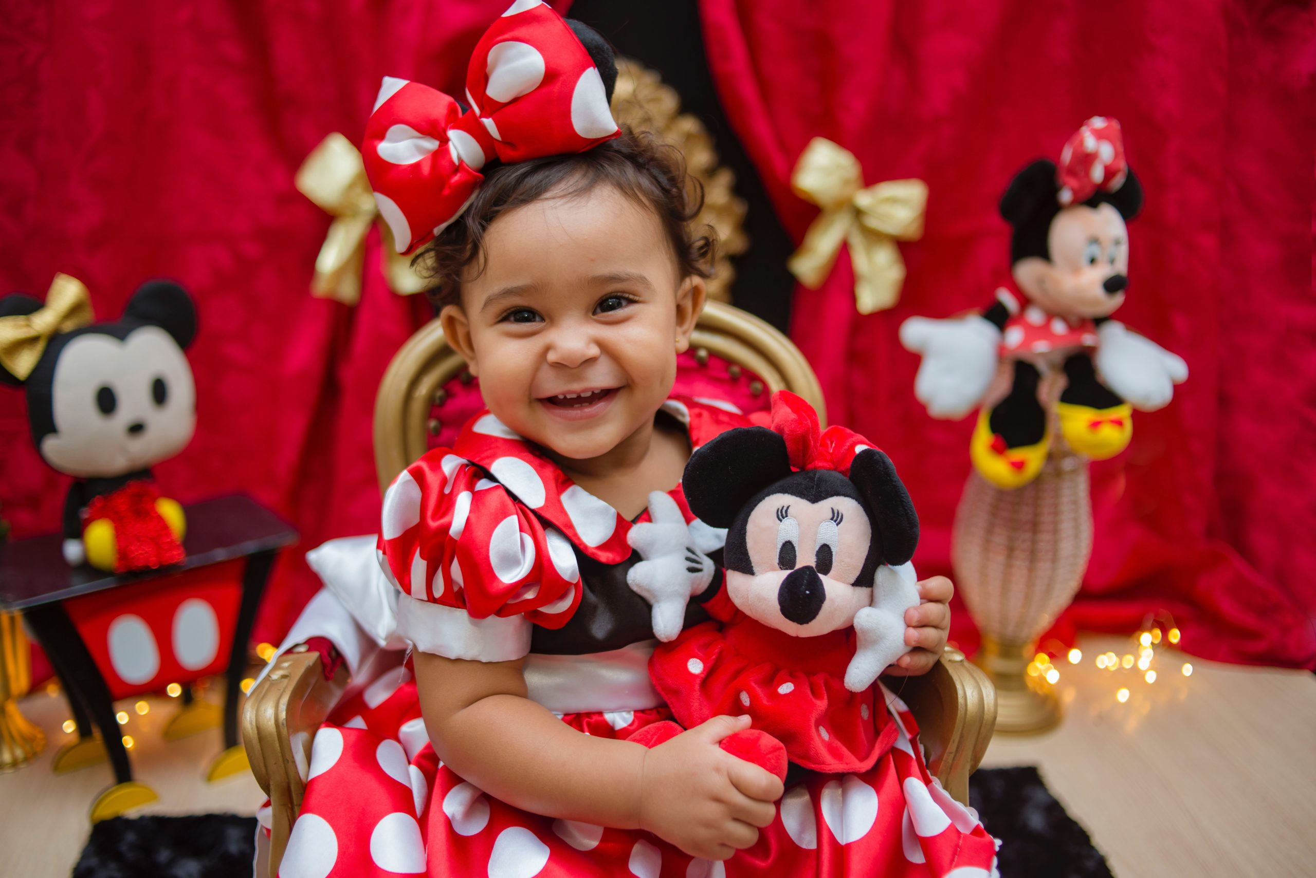 A young girl dresses up as her favorite Disney character, the iconic Minnie Mouse