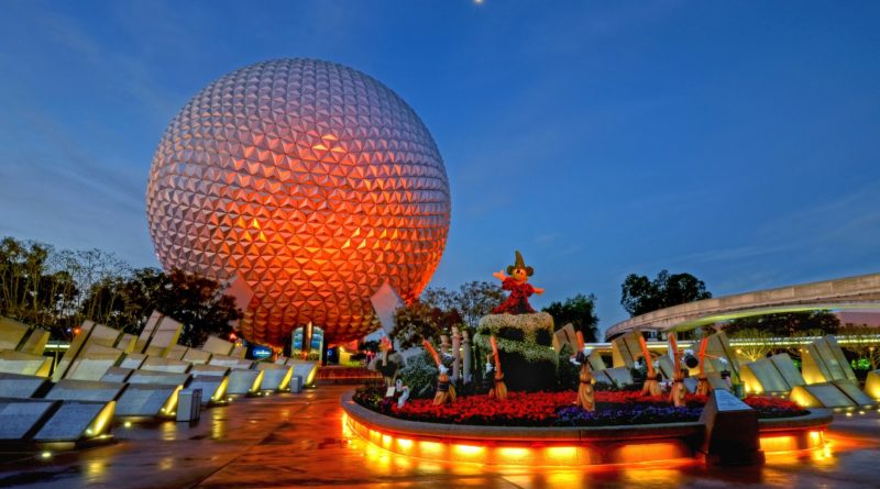 Epcot in Walt Disney World lit up in the evening