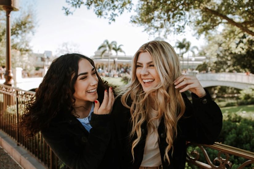 Two girls laughing at Magic Kingdom Park in Orlando