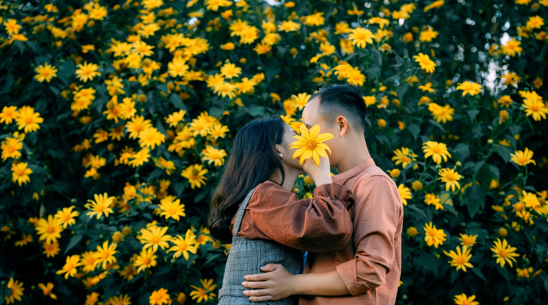 a couple with floral background