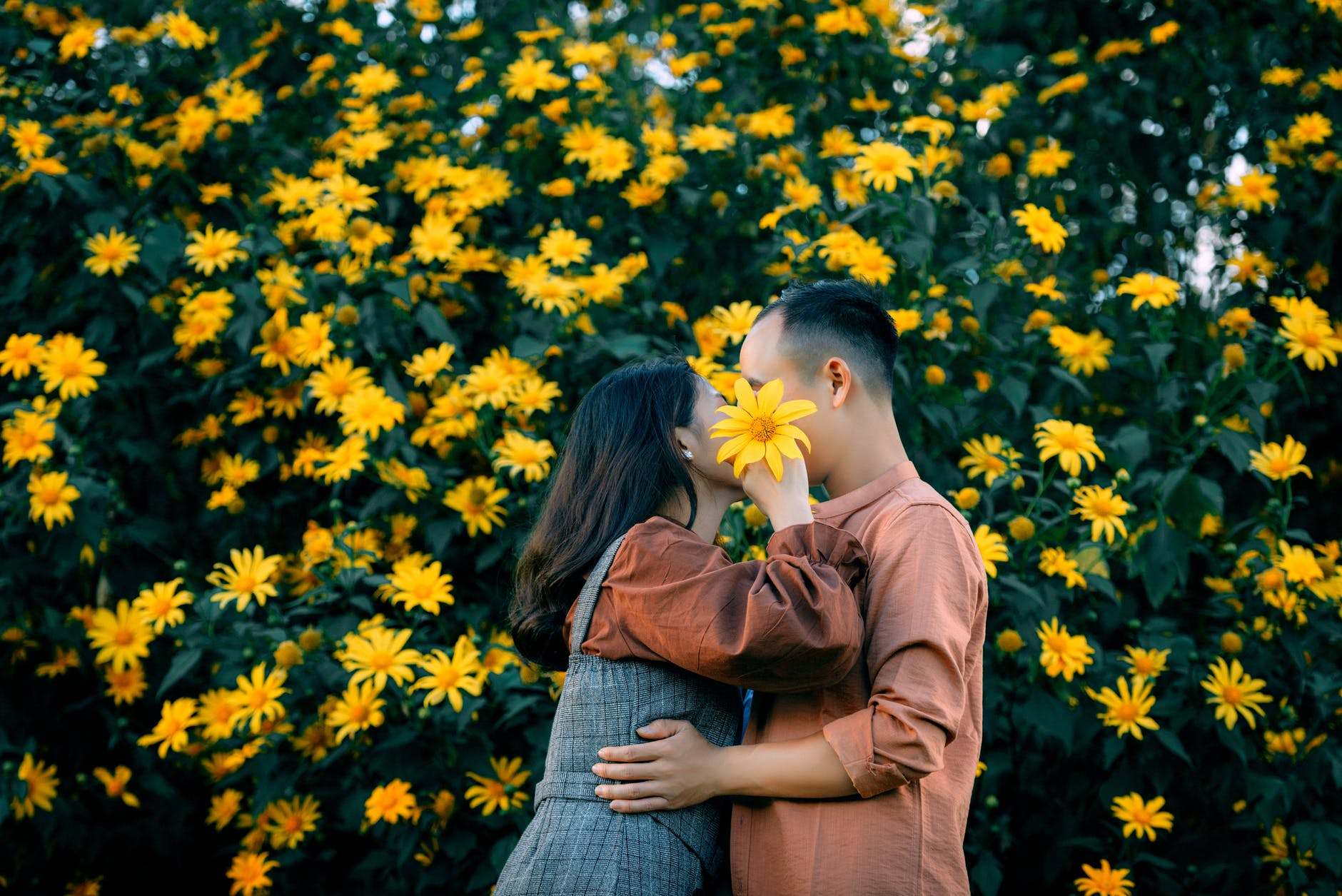 a couple with floral background